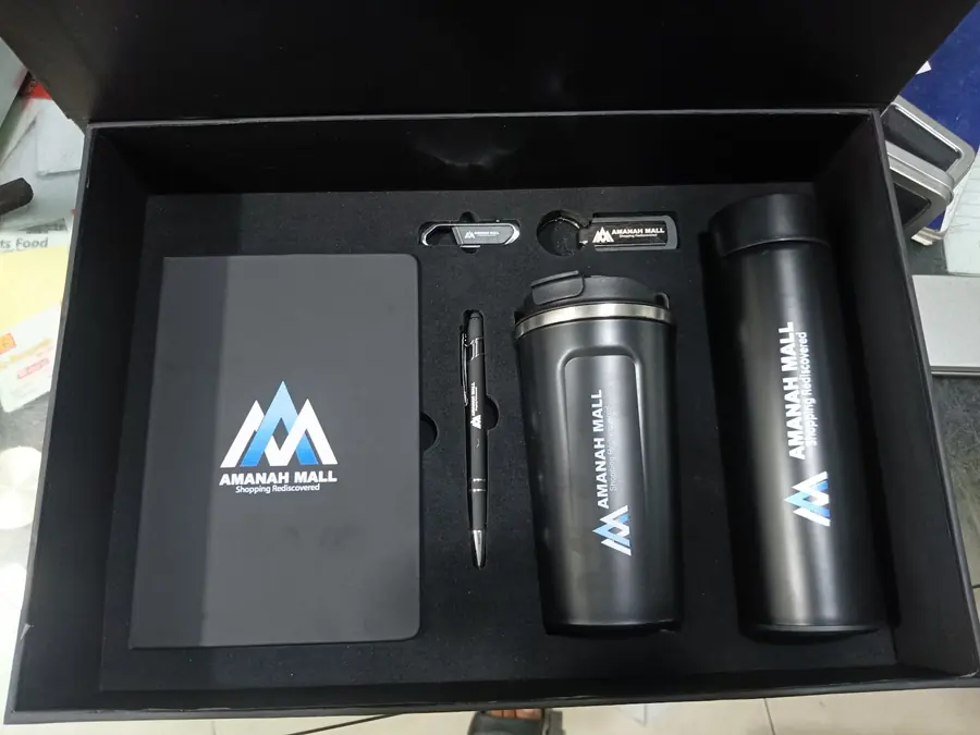 Corporate gift set with a branded box, bottle, pen and diary